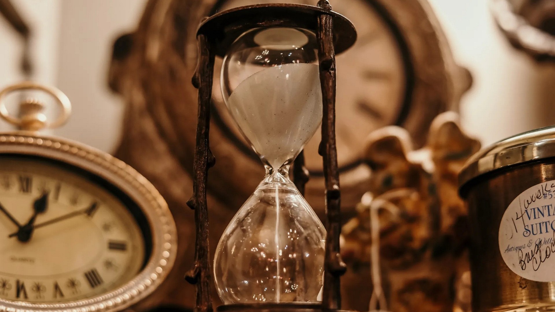 Sand flowing through an hourglass